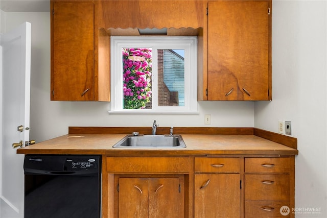 6027 S Bell St, Tacoma, WA 98408 - kitchen featuring dishwasher, a sink, brown cabinetry, and light countertops