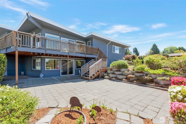 18215 3rd Pl SW, Normandy Park, WA 98166 - rear view of property with a patio area, a wooden deck, and stairway