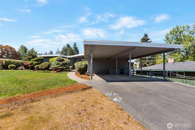 18215 3rd Pl SW, Normandy Park, WA 98166 - view of car parking featuring asphalt driveway and an attached carport