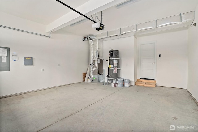 garage featuring a garage door opener and water heater