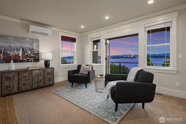 living area featuring a wall mounted AC, carpet flooring, ornamental molding, baseboards, and recessed lighting