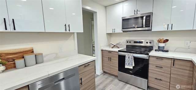 1442 E 31st St, Tacoma, WA 98404 - kitchen with modern cabinets and stainless steel appliances