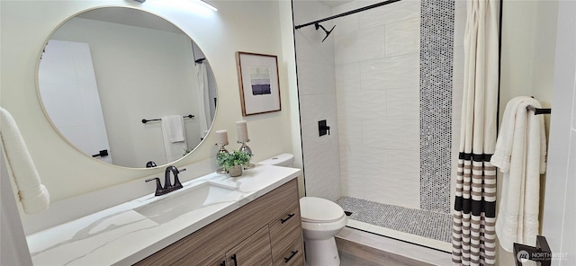 1442 E 31st St, Tacoma, WA 98404 - bathroom with vanity, toilet, and a shower stall