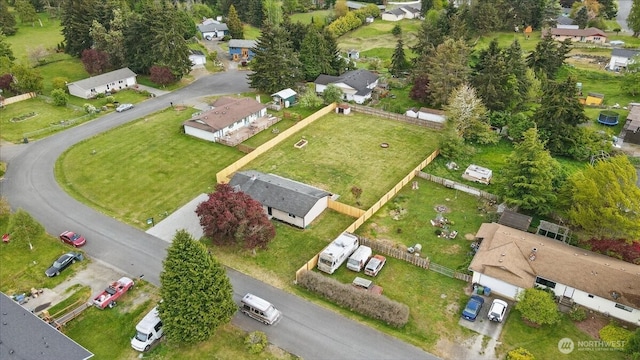 aerial view of property's location featuring nearby suburban area