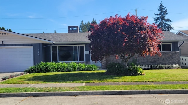 3129 Hudson St, Longview, WA 98632 - view of front of property with a front lawn, a garage, stone siding, and a shingled roof