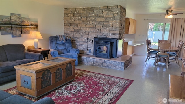 3129 Hudson St, Longview, WA 98632 - living room with a ceiling fan and a wood stove