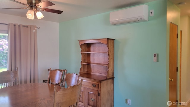 3129 Hudson St, Longview, WA 98632 - dining space featuring a wall unit AC and a ceiling fan