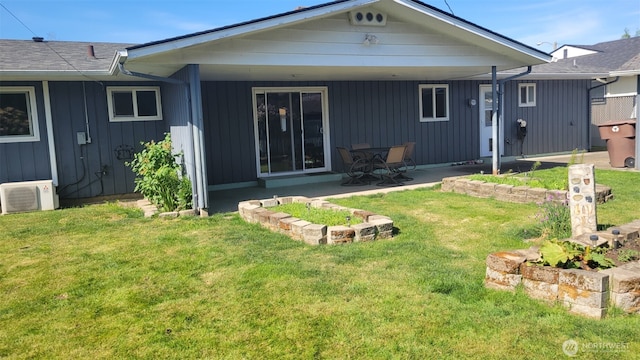 3129 Hudson St, Longview, WA 98632 - back of house with a patio, a yard, and board and batten siding
