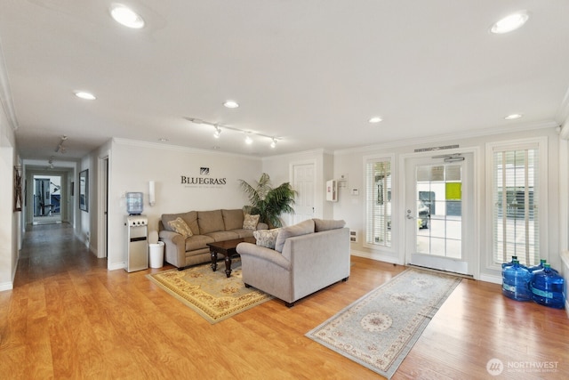 12404 E Gibson Rd Unit Q202, Everett, WA 98204 - living area with crown molding, light wood finished floors, baseboards, recessed lighting, and rail lighting