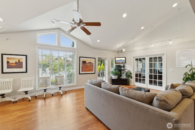 12404 E Gibson Rd Unit Q202, Everett, WA 98204 - living area featuring vaulted ceiling, light wood-style floors, ceiling fan, recessed lighting, and baseboards