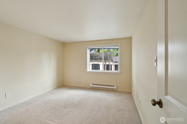 12404 E Gibson Rd Unit Q202, Everett, WA 98204 - carpeted empty room with a baseboard radiator and baseboards