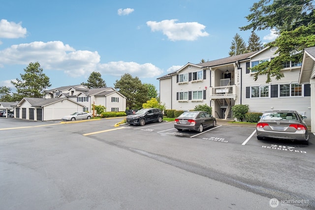 12404 E Gibson Rd Unit Q202, Everett, WA 98204 - uncovered parking lot featuring a residential view