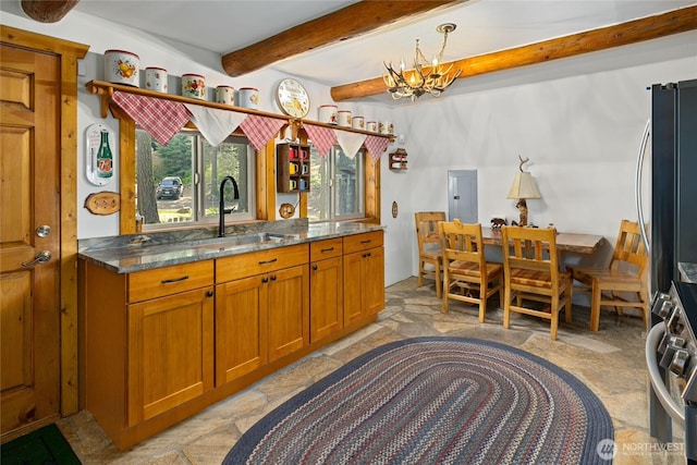 21 Two Springs Rd, Cle Elum, WA 98922 - bathroom featuring a chandelier, beamed ceiling, stone finish flooring, and vanity