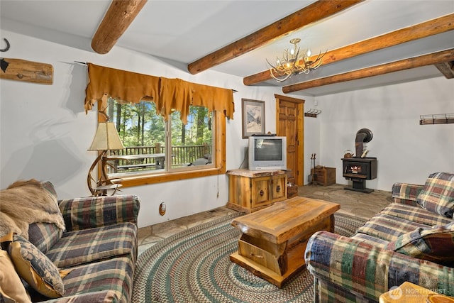 21 Two Springs Rd, Cle Elum, WA 98922 - living room featuring a wood stove, beam ceiling, and a chandelier