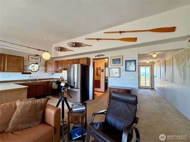 living room featuring lofted ceiling and light carpet