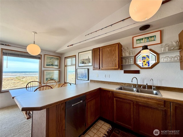 kitchen featuring a sink, a peninsula, open shelves, dishwasher, and vaulted ceiling
