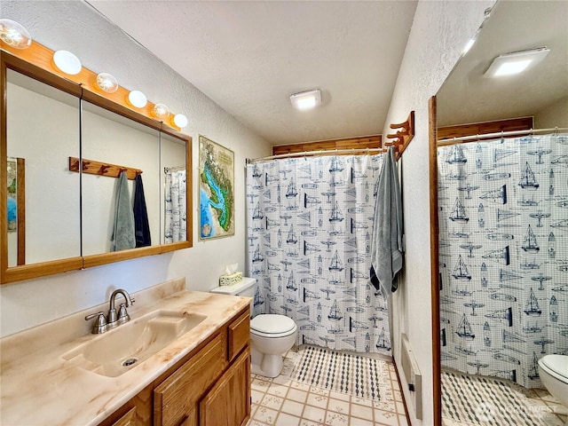 bathroom with toilet, tile patterned floors, vanity, and a shower with shower curtain