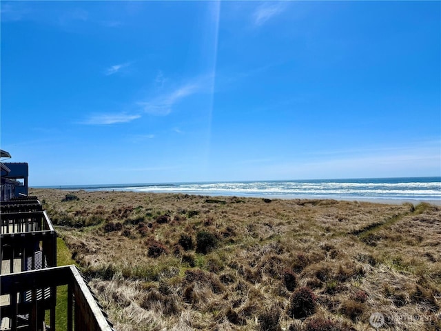 property view of water featuring a view of the beach