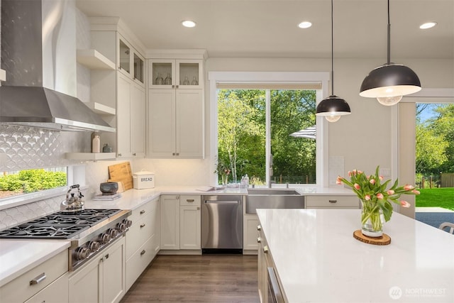 8650 NE Reserve Way, Bainbridge Island, WA 98110 - kitchen with wall chimney range hood, appliances with stainless steel finishes, a sink, open shelves, and recessed lighting