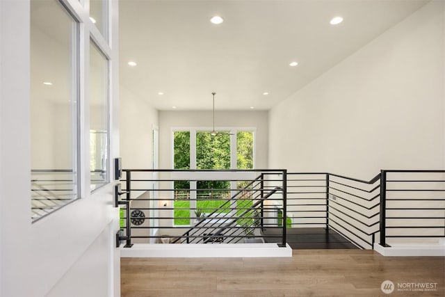 8650 NE Reserve Way, Bainbridge Island, WA 98110 - stairway featuring wood finished floors and recessed lighting