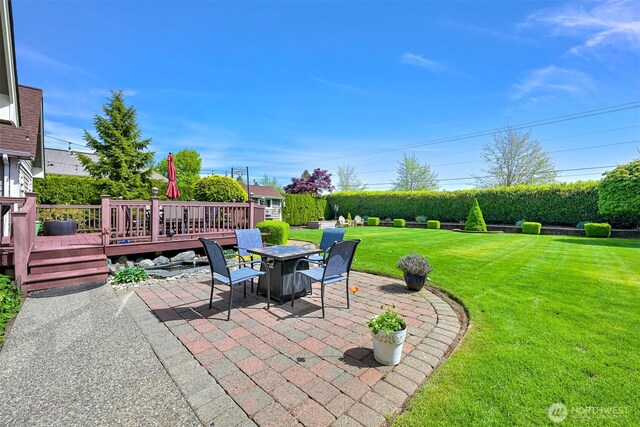 624 E Maberry Dr, Lynden, WA 98264 - view of patio / terrace with a wooden deck and a fire pit