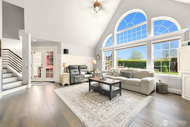 624 E Maberry Dr, Lynden, WA 98264 - living area with high vaulted ceiling, a ceiling fan, hardwood / wood-style flooring, stairs, and french doors