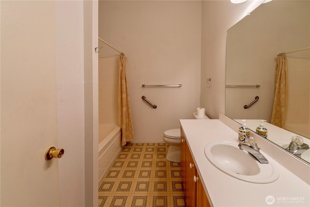 bathroom with shower / tub combo, toilet, baseboards, tile patterned floors, and vanity