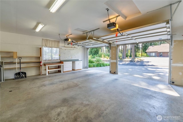 garage featuring a garage door opener