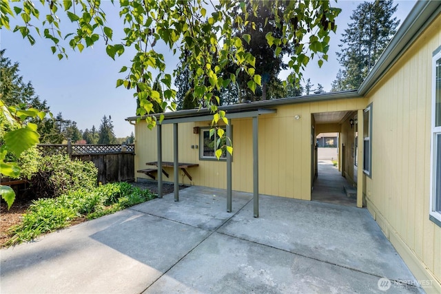 view of patio with fence