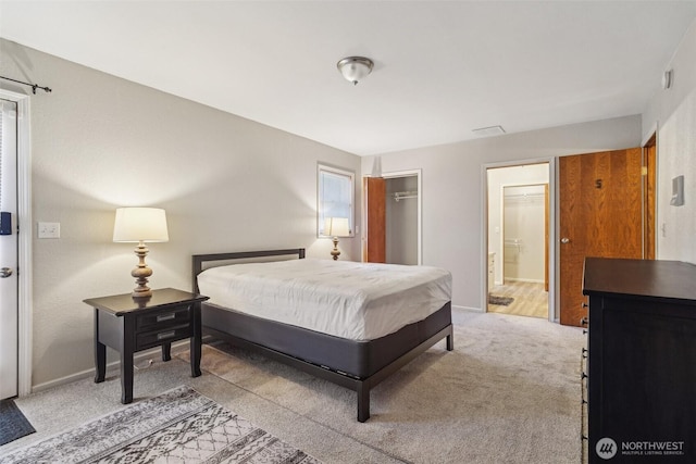 3420SW 344th St, Federal Way, WA 98023 - bedroom featuring light colored carpet, baseboards, connected bathroom, and a closet