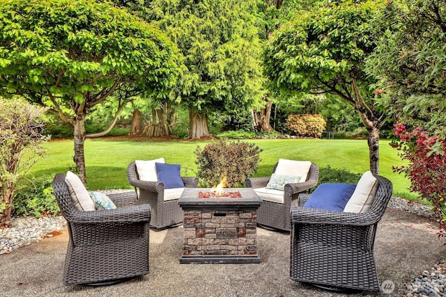 view of patio featuring a fire pit