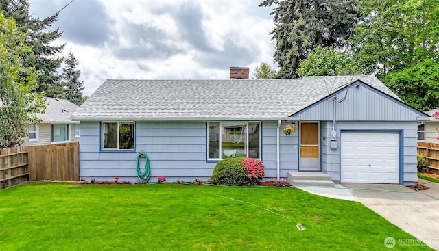 ranch-style house featuring roof with shingles, fence, a chimney, and a front yard