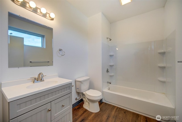 2508 N 50th St, Seattle, WA 98103 - full bathroom with shower / bath combination, vanity, toilet, and wood finished floors