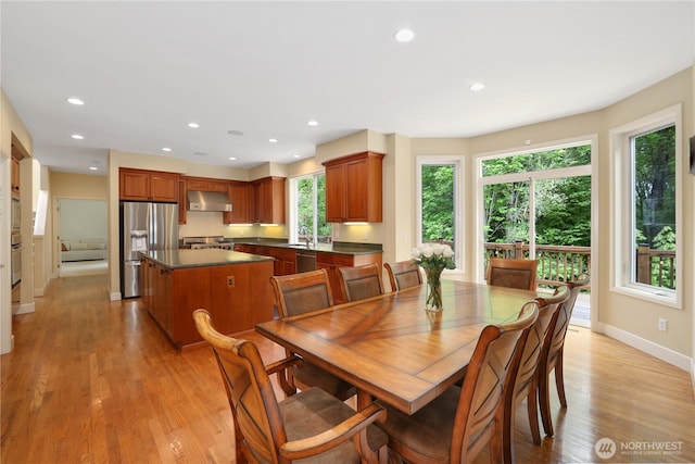 25846 NE 4th Pl, Sammamish, WA 98074 - dining room featuring light wood finished floors, recessed lighting, and baseboards