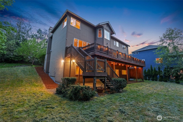 25846 NE 4th Pl, Sammamish, WA 98074 - rear view of house with stairs, a wooden deck, and a yard