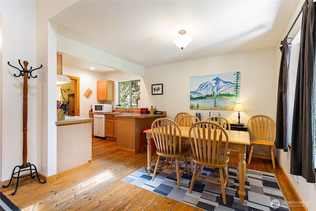 12026 Shuksan Rim Dr, Deming, WA 98244 - dining area with light wood-style floors and recessed lighting