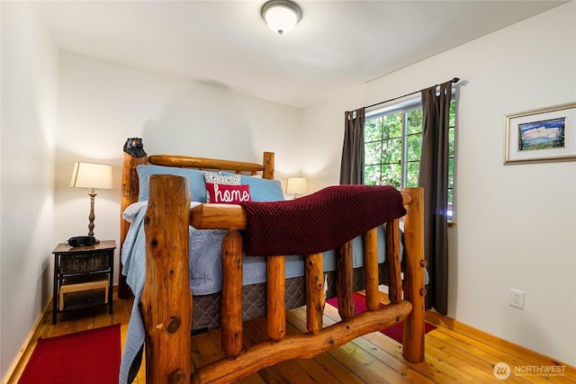 12026 Shuksan Rim Dr, Deming, WA 98244 - bedroom with hardwood / wood-style flooring and baseboards