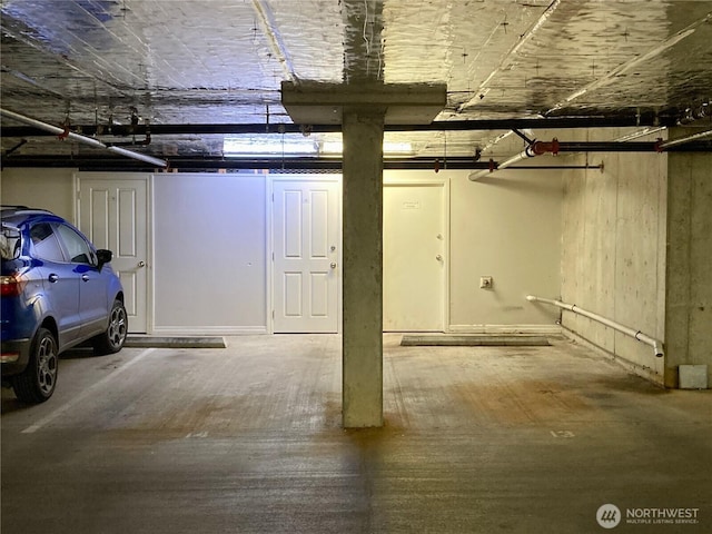215 20th Ave E Unit 305, Seattle, WA 98112 - below grade area featuring a garage