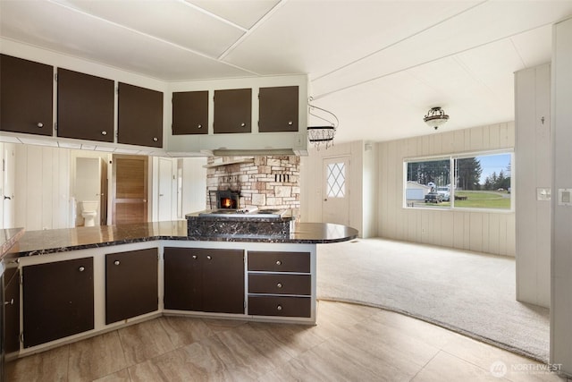 252 Romerman Rd, Chehalis, WA 98532 - kitchen featuring dark brown cabinetry, open floor plan, and dark stone countertops