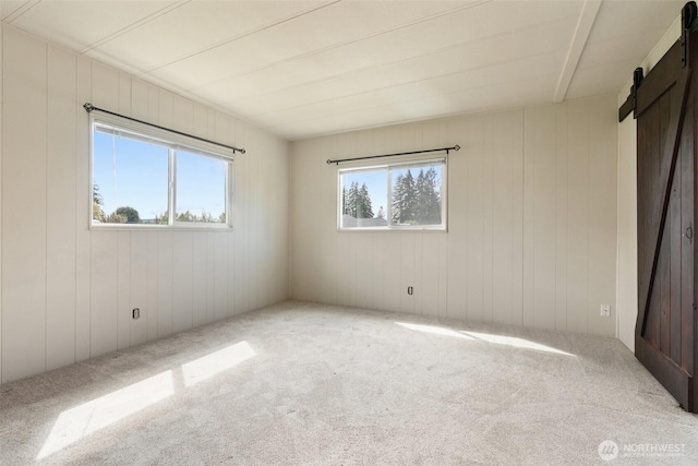 252 Romerman Rd, Chehalis, WA 98532 - unfurnished bedroom with carpet flooring and a barn door
