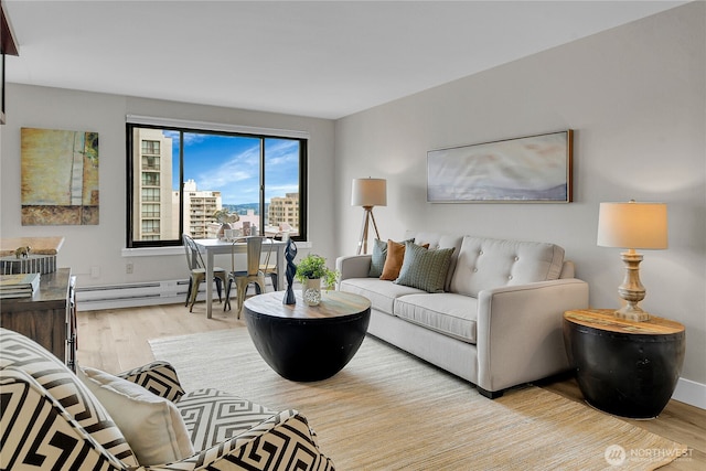 1105 Spring St Unit 1306, Seattle, WA 98104 - living room featuring wood finished floors, a baseboard heating unit, and a view of city