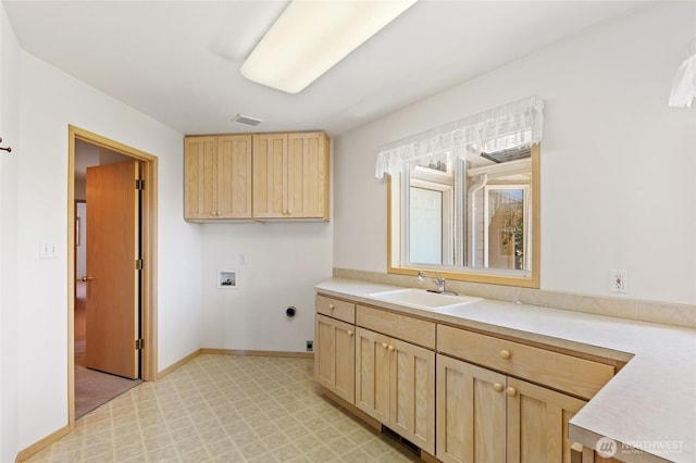 laundry room with a sink, laundry area, washer hookup, hookup for an electric dryer, and visible vents