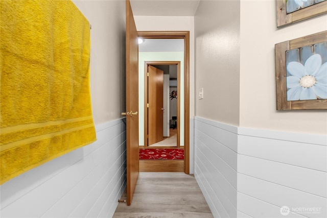 corridor with wood finished floors