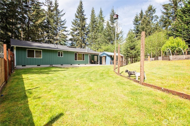 rear view of house featuring crawl space