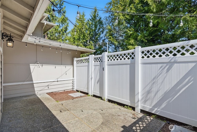 view of patio with fence