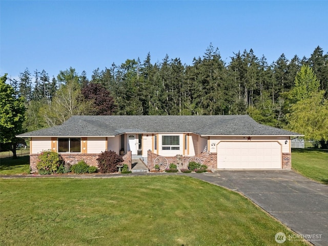 ranch-style home with brick siding, asphalt driveway, an attached garage, and a front lawn