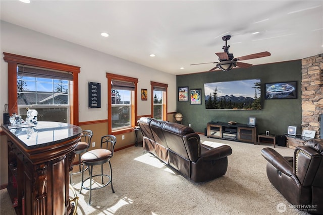 living room featuring carpet, a ceiling fan, and recessed lighting