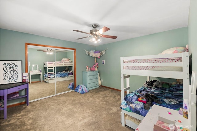 bedroom with carpet floors, a closet, and ceiling fan