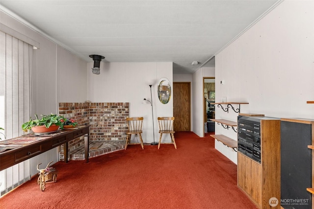 sitting room featuring carpet