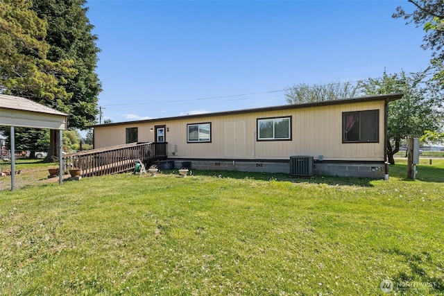 manufactured / mobile home featuring a front lawn, central AC, and crawl space